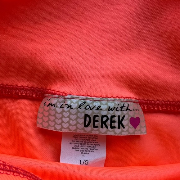 I’m in love with Derek hot orange pencil skit with opening in the back. Size L - Picture 6 of 6